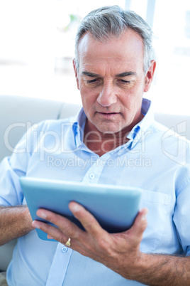 Businessman holding digital tablet