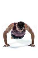 Fit man in sportswear doing push ups
