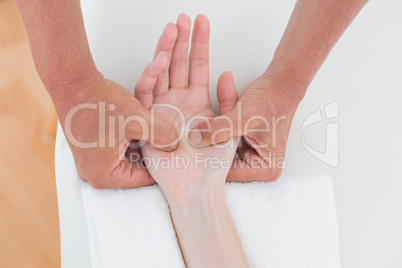 Physiotherapist doing hand massage