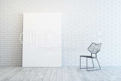 white room with blank picture and chair