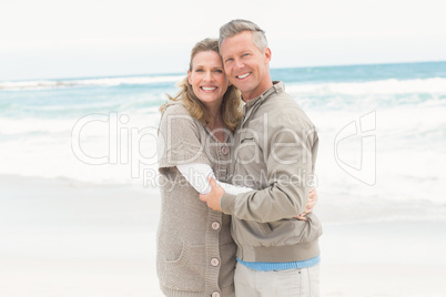 Smiling man holding his partner