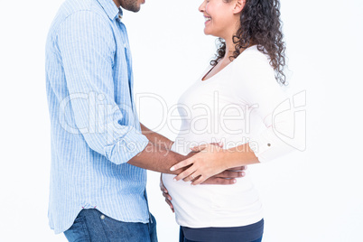 Midsection of couple against white background