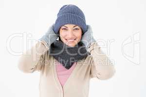 Smiling brunette wearing warm clothes