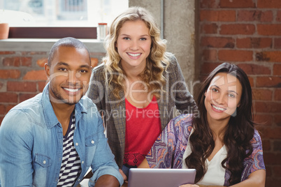 Portrait of happy team in office