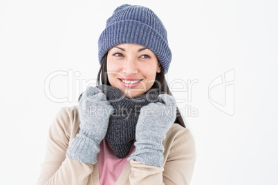 Smiling brunette wearing warm clothes