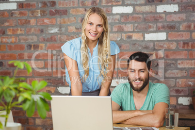 Portrait of smiling business people posing