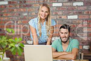 Portrait of smiling business people posing