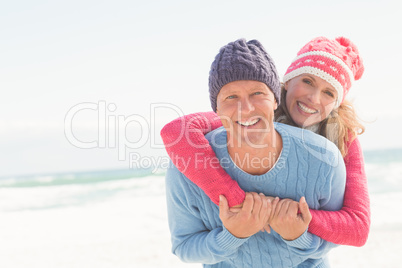 Smiling happy couple hugging each other