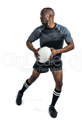 Rugby player with ball running