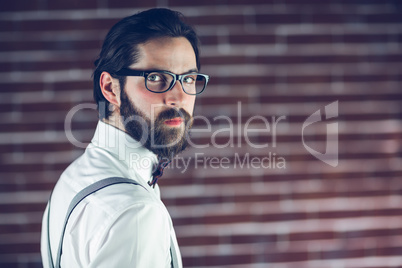 Portrait of serious hipster wearing eyeglasses