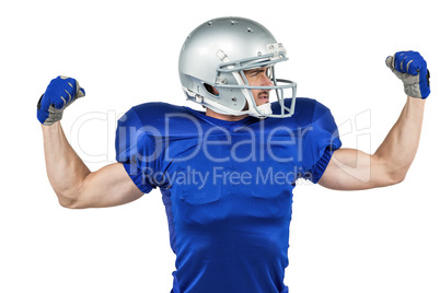 American football player flexing muscles