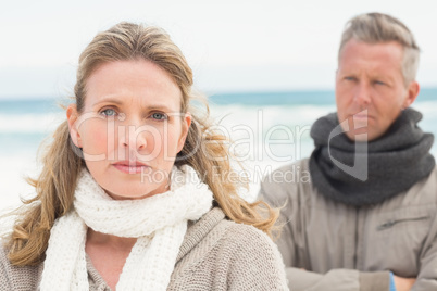 Upset couple look away from each other