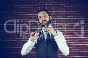 Portrait of man holding scissors