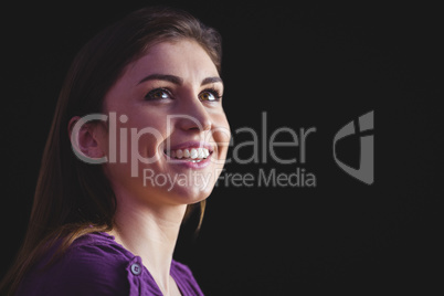 Woman smiling and looking up