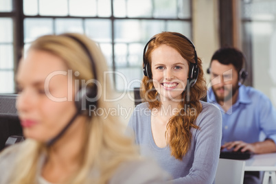 Portrait of smiling female operator