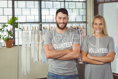 Portrait of smiling volunteers in office