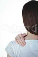 Woman touching her sore shoulder