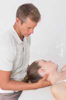 Woman receiving neck massage