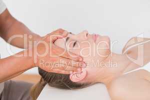 Woman receiving neck massage