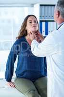 Doctor examining woman