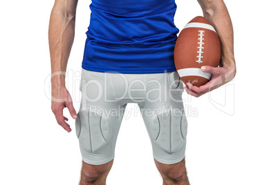 Sports player holding ball