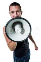 Male trainer yelling through megaphone