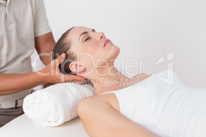 Woman receiving neck massage