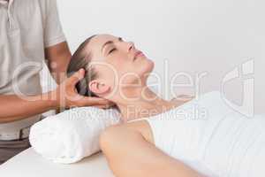 Woman receiving neck massage