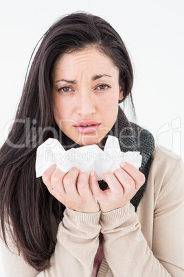 Sick brunette looking at camera