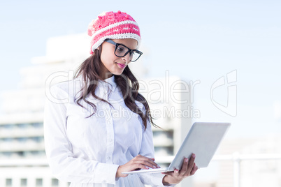 Pretty woman using her laptop