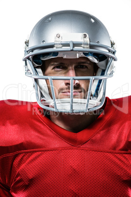 Confident American football player in red jersey