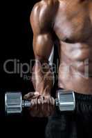 Cropped image of muscular man exercising with dumbbell