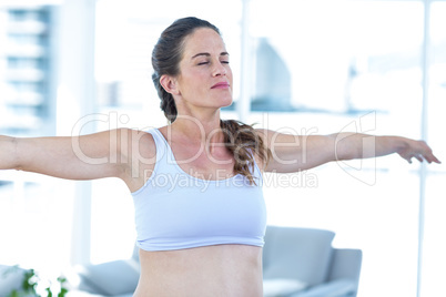 Pregnant woman performing yoga Pregnant woman performing yoga