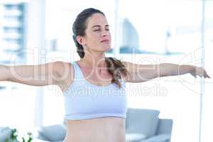 Pregnant woman performing yoga