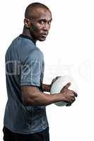 Athlete holding rugby ball