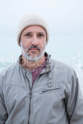 Close up of a man wearing at hat