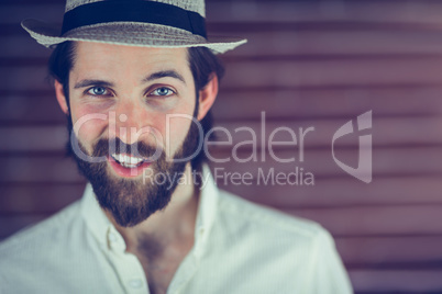 Portrait of cool hipster wearing hat