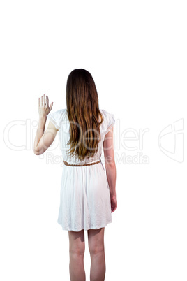 Girl in white dress waving