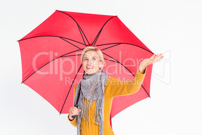 Woman checking to see if its raining