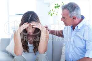 Psychiatrist advising pregenat woman in clinic