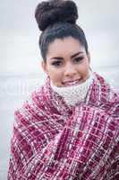 Beautiful woman wrapped up in warm clothing
