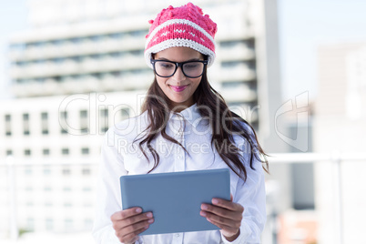 Pretty woman using her tablet pc