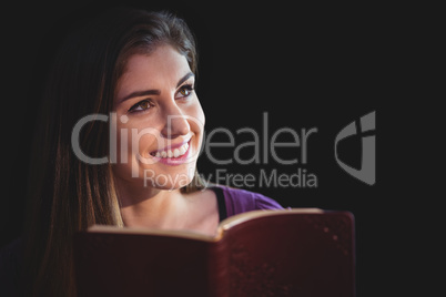 Woman praying with her bible