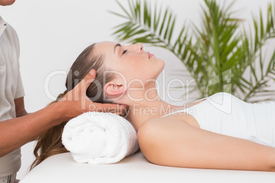 Woman receiving neck massage