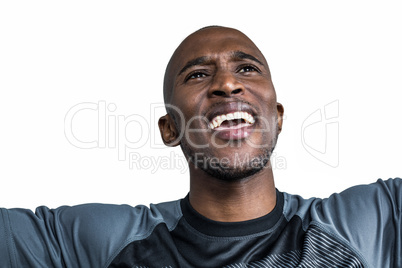 Close-up of cheerful sportsman