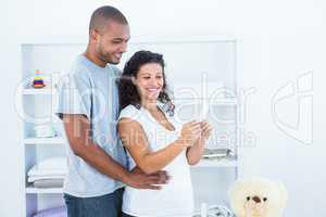 Young couple standing in room