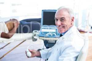 Portrait of smiling male doctor