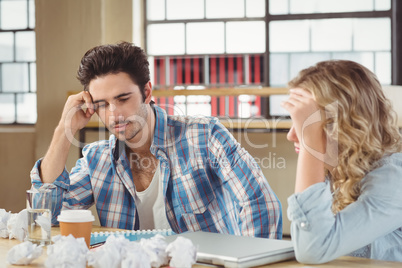 Tensed colleagues at office