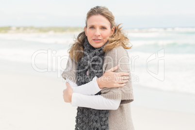 Smiling woman feeling the cold