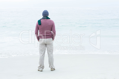 Smiling man wearing warm clothes